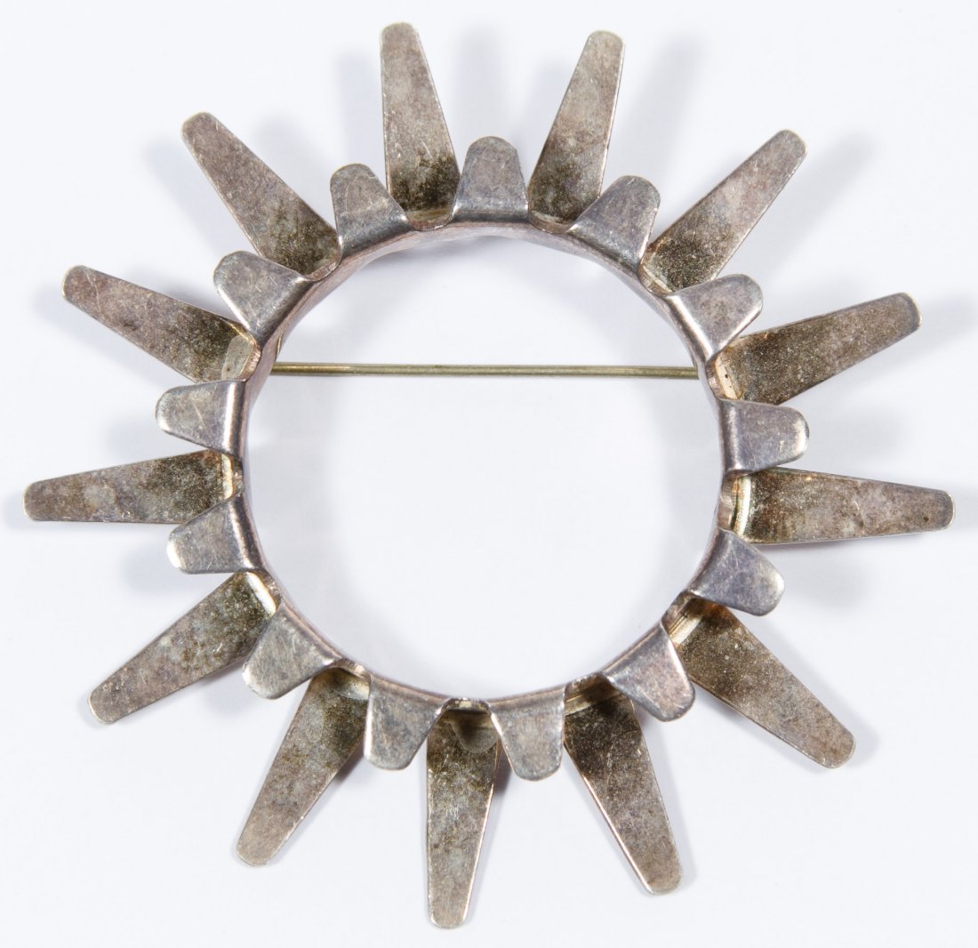 Tone Vigeland Sterling Silver Pin: Tone Vigeland Sterling Silver Pin Having a round sun ray shape; marked on back Diameter: 2.50 inches Weight: 10.52 dwts. Category: Jewelry & Timepieces > Sterling Silver Tax Status: Subject to an 8.25