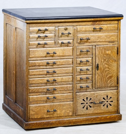 Oak Apothecary Cabinet: Oak Apothecary Cabinet Having a black slate top with twenty-one small drawers and compartments Height: 33.00 inches, Width: 31.00 inches, Depth: 20.50 inches Category: Furniture > American Shipping St