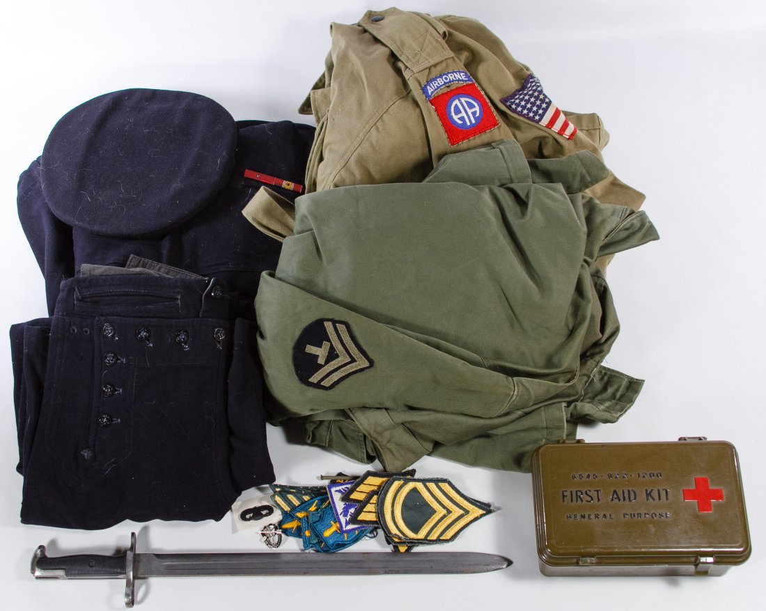 World War II to Vietnam Era Military Assortment: World War II to Vietnam Era Military Assortment Including World War II German cigarette card prints; a World War II era US Navy blue wool jacket, hat and pants with the printed 'Naval Clothing Factory