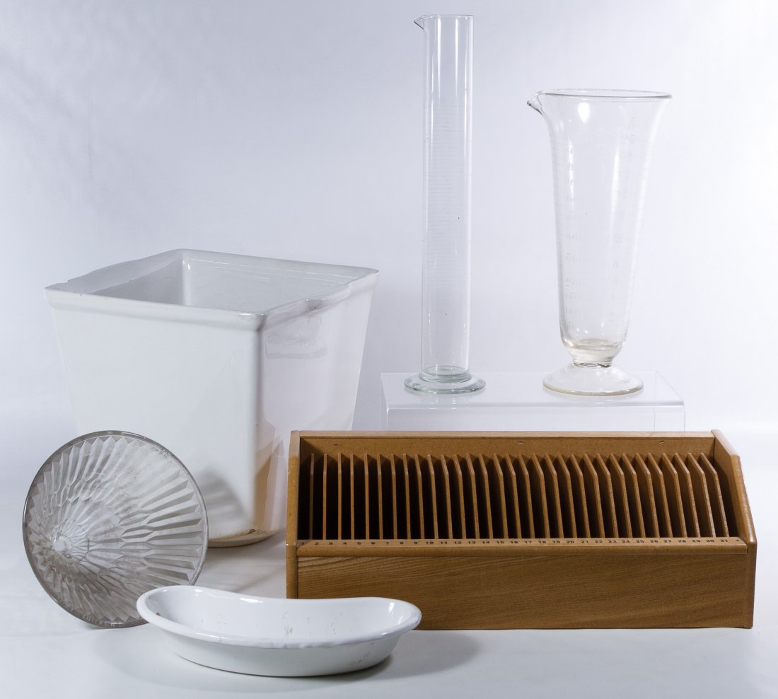 Apothecary Glass and Ceramic Flask Assortment: Apothecary Glass and Ceramic Flask Assortment Including graduated beakers, a wood file drawer, a ceramic emulsifier bowl and a metal chin bowl Length: 17.00 inches (file drawer) Category: Collectibles