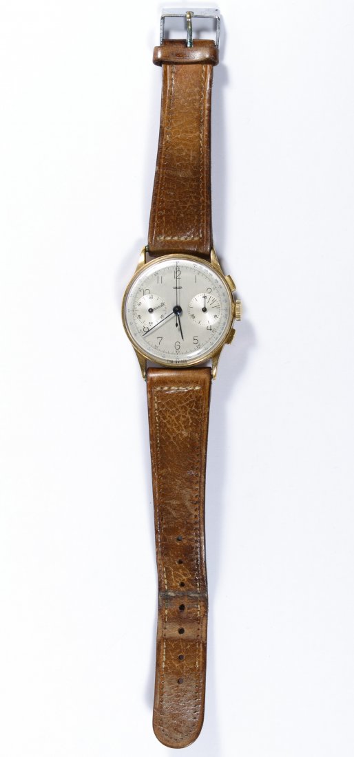 Jaeger LeCoultre 14k Gold Cased Wrist Watch /: Jaeger LeCoultre 14k Gold Cased Wrist Watch / Chronograph Movement 285 having serial #158194 and seventeen jewels; on a brown leather band; marked inside back cover of case Length: 7.00 inches (adjust