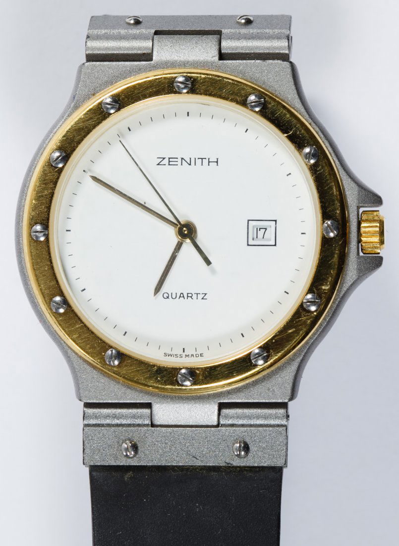 Zenith Wrist Watch: Zenith Wrist Watch Model 19-0290-197 having a Zenith 19.7 V8 Swiss movement with one jewel with a gold plated bezel and stainless steel case on a rubber wrist band Width: 1.25 inches (with lug) Catego