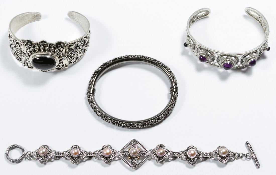 Sterling Silver Bracelet Assortment: Sterling Silver Bracelet Assortment Four pieces, one having faux pearls and 18k gold trim; all marked 925 inside band Length: 7.50 inches (chain bracelet) Weight: 78.51 dwts. (total weight) Category: 