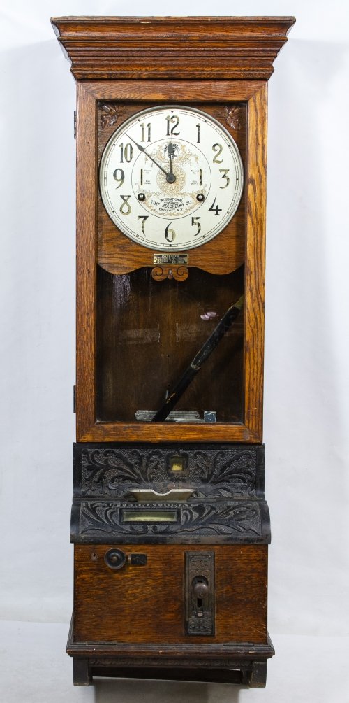 International Time Recording Co. Time Clock: International Time Recording Co. Time Clock c.1908 oak cased clock with cast iron accents, metal face, glass door and pendulum; made in Endicott, NY Height: 49.00 inches, Width: 17.00 inches, Depth: 1
