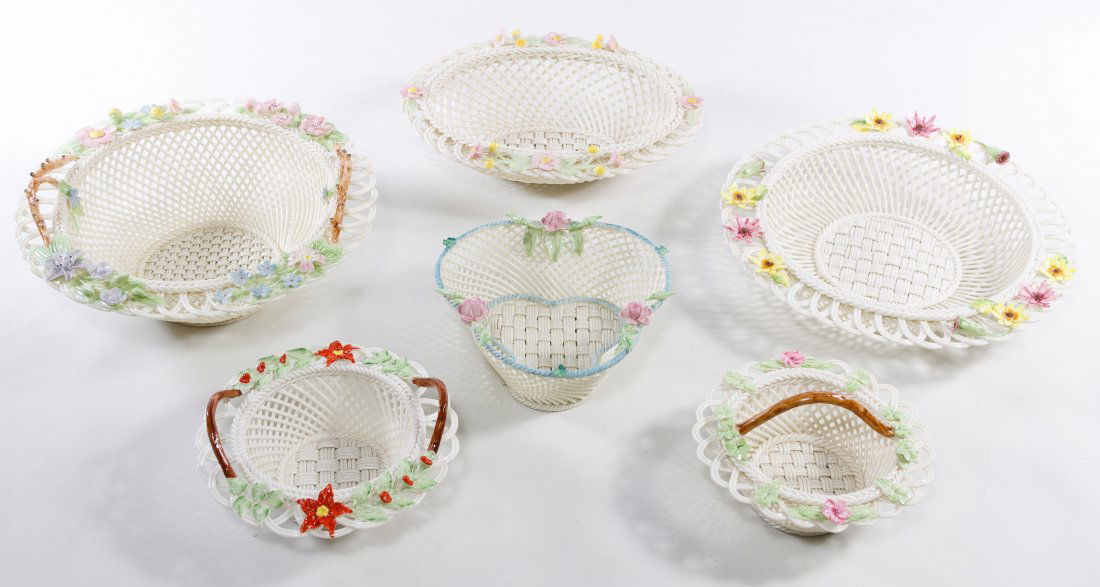 Belleek Basket Assortment: Belleek Basket Assortment Six porcelain woven baskets with floral rims; two having the 7th mark and three having the 11th mark including a 2006 limited edition #758/1000 Diameter: 8.75 inches (largest