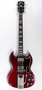 Gibson 'Les Paul' SG Electric Guitar: Gibson 'Les Paul' SG Electric Guitar 1963, impressed serial #127236 en verso on the top of the neck, cherry wood six string right handed guitar; produced in Kalamazoo, Michigan; together with original