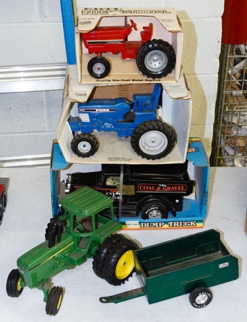 Ertl and Nylint Steel Toy Truck Assortment: Ertl and Nylint Steel Toy Truck Assortment Including a dump truck and three tractors Height: 8.00 inches, Width: 12.00 inches (green tractor) Category: Toys and Dolls > Vintage Toys Shipping Status: D