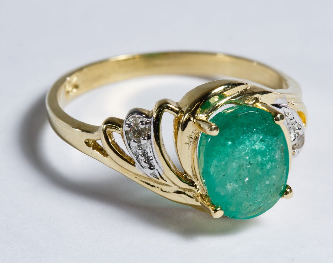 14k Gold, Emerald and Diamond Ring: 14k Gold, Emerald and Diamond Ring Having an oval cut emerald adorned with diamond chips; marked 14k inside band Size: 7.5 Weight: 1.90 dwts. (total weight) Category: Jewelry & Timepieces > 14k Gold S