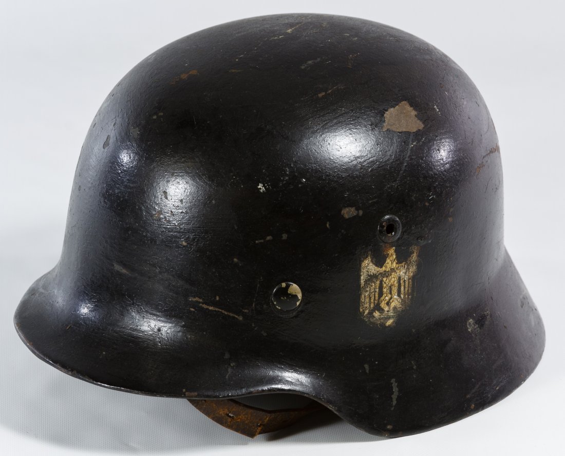 World War II German M40 Wehrmacht Helmet: World War II German M40 Wehrmacht Helmet Having a single decal, leather liner and chin strap Length: 11.00 inches, Width: 9.00 inches Category: Military & Weapons > World War II Shipping Status: Leona