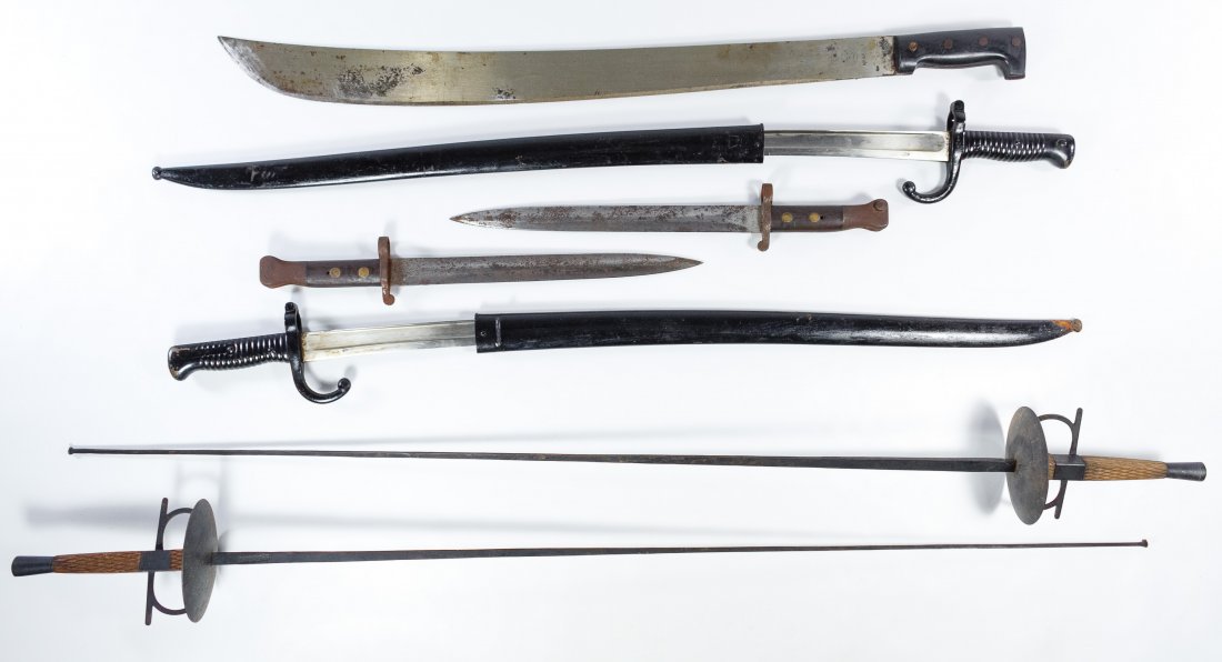 Decorative Sword and Dagger Assortment: Decorative Sword and Dagger Assortment Including a pair of Spanish fencing swords, a pair of French bayonet swords with scabbards, a pair of British bayonets and a Mexican machete Length: 42.00 inches