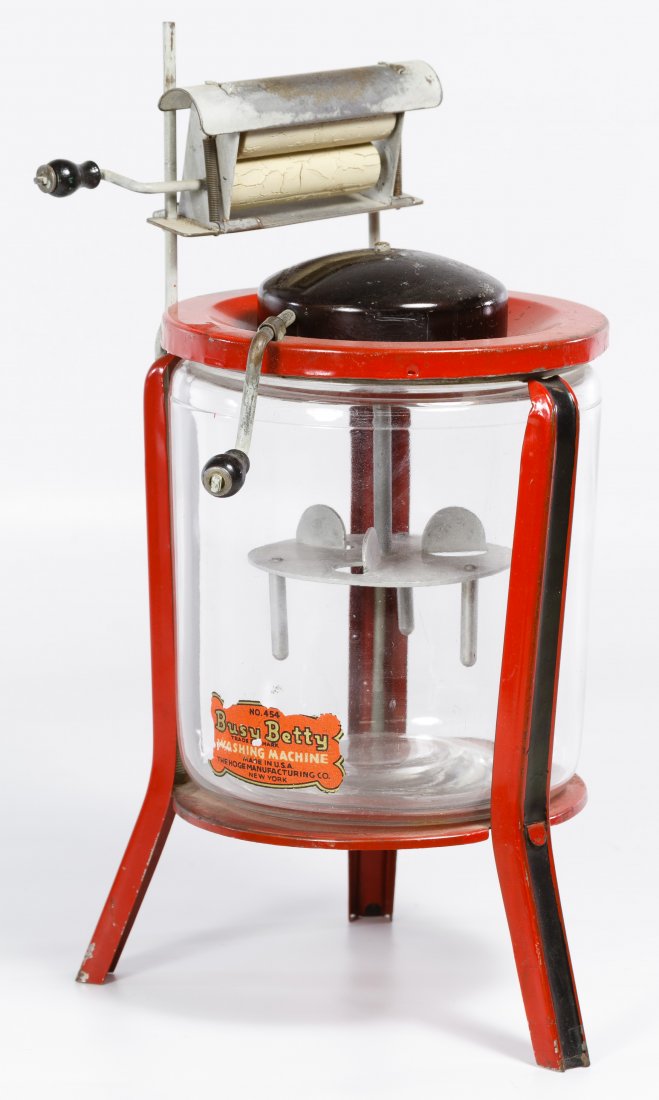 Hoge Mfg Co. No.454 'Busy Betty' Toy Washing Machine: Hoge Mfg Co. No.454 'Busy Betty' Toy Washing Machine Having a red and black metal frame with glass drum, attached maker sticker on the glass Height: 11.00 inches Category: Toys and Dolls > Vintage Toy