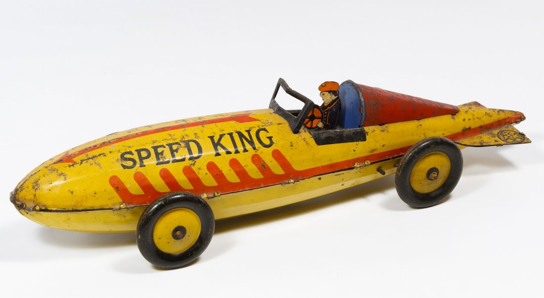 Marx 'Speed King' Wind-Up Lithographed Tin Race Car: Marx 'Speed King' Wind-Up Lithographed Tin Race Car Having original tin driver, two stamped maker marks, including key Length: 16.75 inches Category: Toys and Dolls > Vintage Toys Shipping Status: Leo