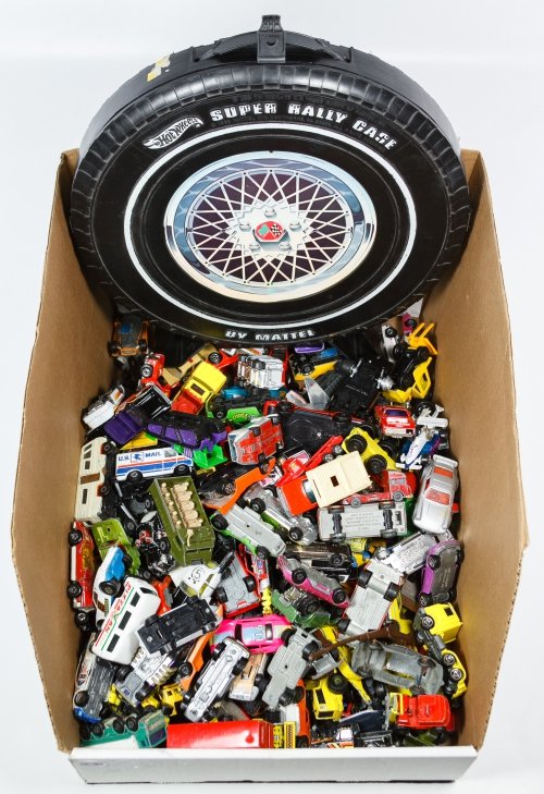 Mattel 'Hot Wheels' and Lesney Matchbox Toy Car: Mattel 'Hot Wheels' and Lesney Matchbox Toy Car Assortment Approximately one-hundred eighty cars; together with a Mattel carrying case Height: 14.00 inches (case) Category: Toys and Dolls > Vintage To