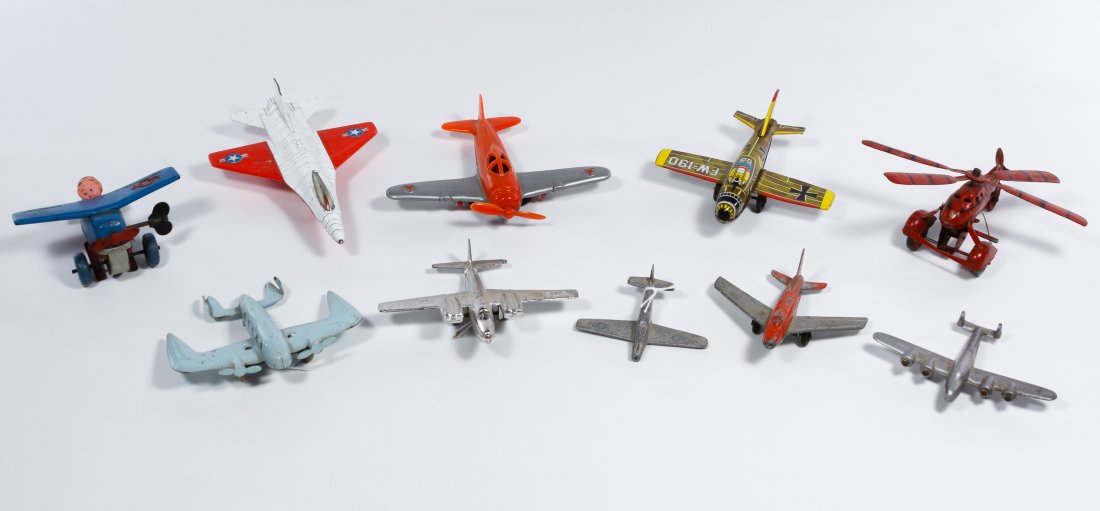 Toy Airplane Assortment: Toy Airplane Assortment Ten airplanes with examples from Hubley and Tootsietoy; including a key wind airplane with a celluloid pilot and a helicopter Length: 6.50 inches (longest) Category: Toys and D