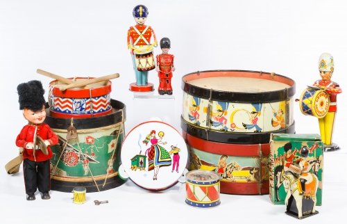 Toy Drummers and Drum Assortment: Toy Drummers and Drum Assortment Including toy drums, a still bank, a tambourine and wind-up toys with examples from Marx, J. Chein, A. Wells & Co. and Noble & Cooley Co Diameter: 11.00 inches (drum) 