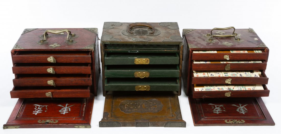 Chinese Mahjong Sets: Chinese Mahjong Sets Including three wood boxes with brass fittings; two boxes have drawers filled with bone and bamboo tiles or bone markers; one box is empty Height: 7.50 inches (largest box) Catego