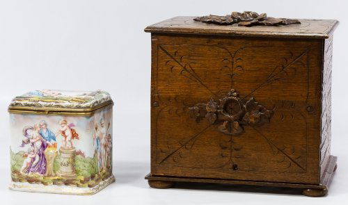 Decorative Boxes: Decorative Boxes Two items including a Capodimonte porcelain box with painted and raised classical figures and an early 20th century carved oak box with applied flowers Height: 9.00 inches, Width: 10.