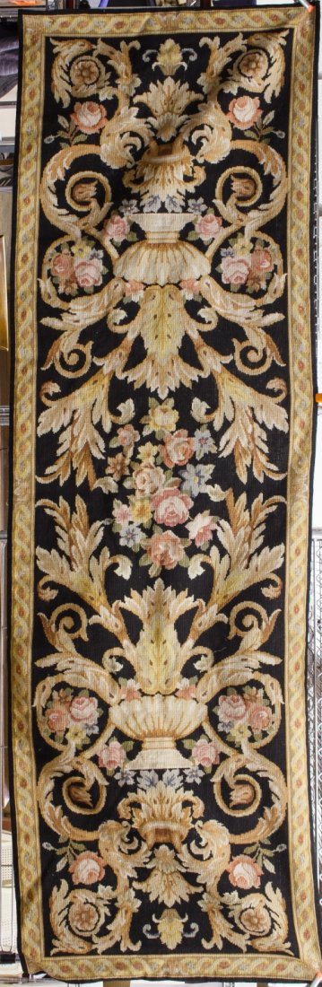Hand Stitched Wool Needlepoint Tapestry Runner: Hand Stitched Wool Needlepoint Tapestry Runner Having a classical scroll, urn and floral motif in soft color tones; hand knotted with netted edge lining Length: 95.00 inches, Width: 30.00 inches Categ