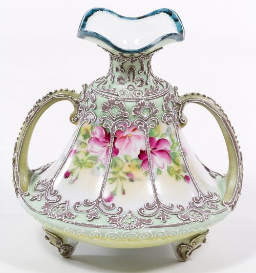 Nippon Moriage Double Handled Vase: Nippon Moriage Double Handled Vase c.1900, unmarked, having four feet with a floral motif Height: 6.00 inches, Width: 5.75 inches Category: Porcelain & Ceramics > Nippon Shipping Status: Due to size,
