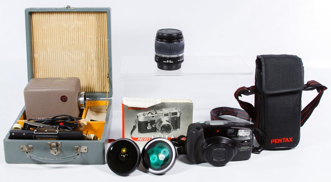 Camera Lens Assortment: Camera Lens Assortment Three lenses including Nikon WC-E63, Nikon FC-E8 and Canon EF-S 18-55mm; together with a Minolta 35 projector, Pentax Zoom 105 and accessories Length: 3.25 inches (Canon lens) C