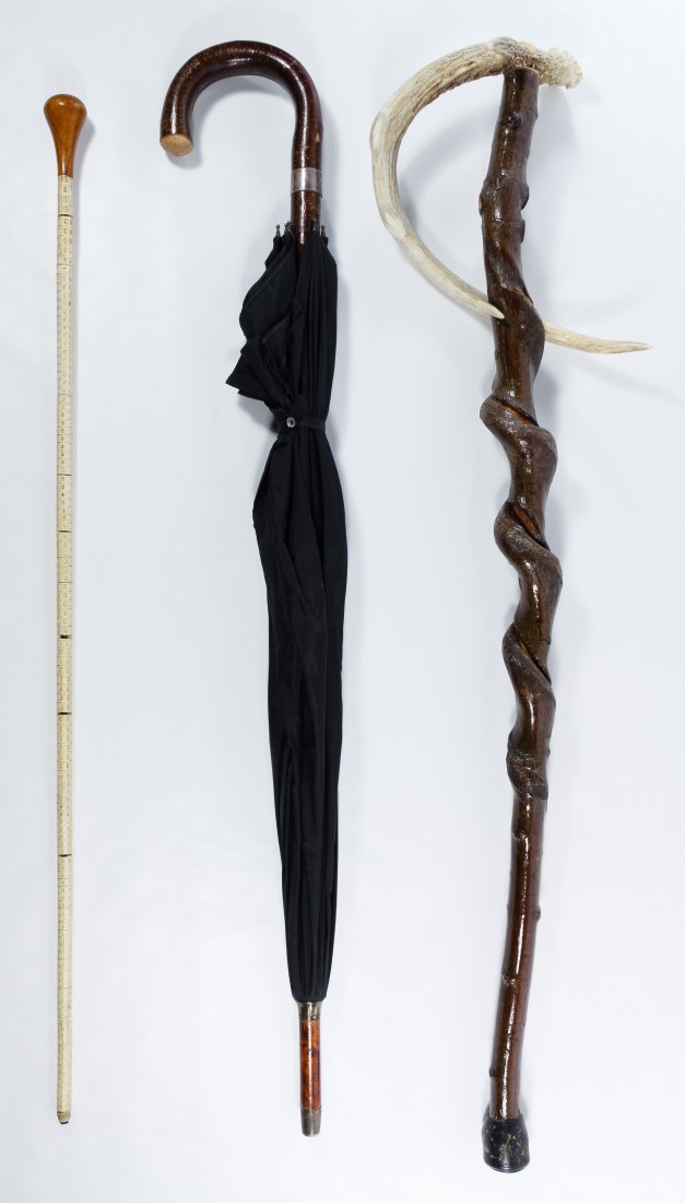 Deer Horn Cane: Deer Horn Cane Together with a wood walking stick and an umbrella with sterling silver band by Swaine, Adeney & Brigg Length: 38.25 inches (deer horn cane) Category: Clothing & Accessories > Canes Shi