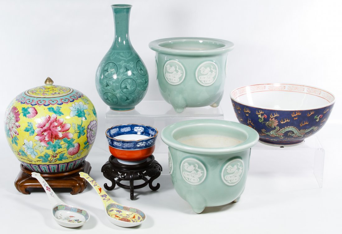 Asian Ceramic Assortment: Asian Ceramic Assortment Including a pair of Celadon cache pots, a Celadon vase, a ginger jar, a bowl, two wood stands, two spoons and a small bowl Height: 10.50 inches (vase) Category: Porcelain & Ce