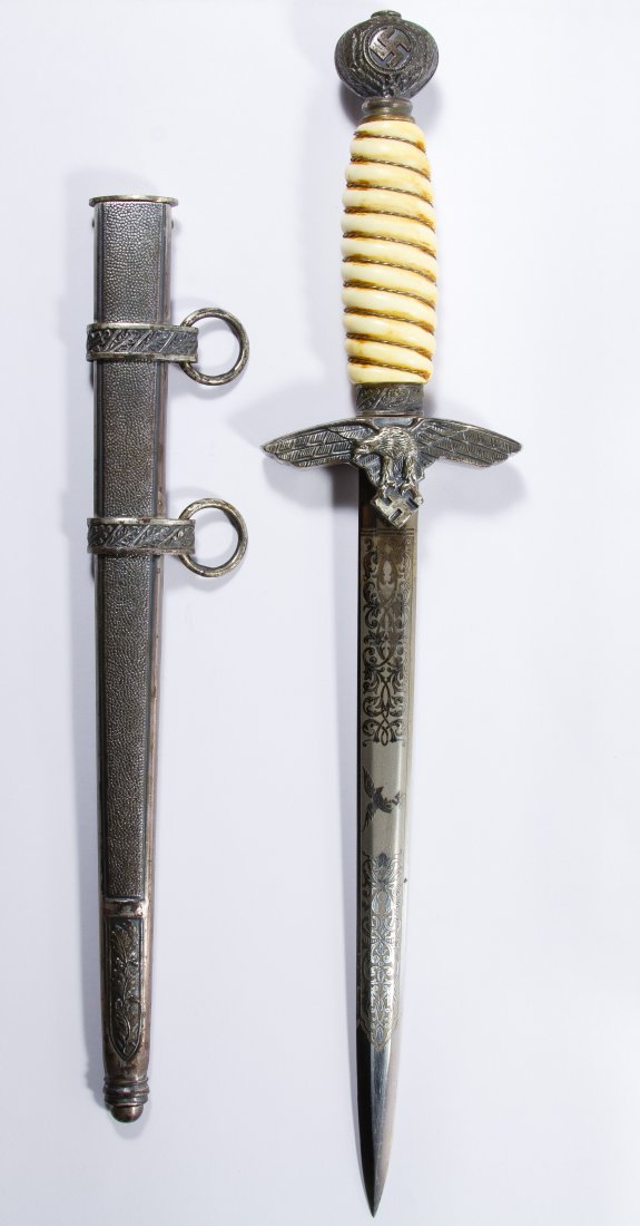 World War II German Luftwaffe Parts Dagger: World War II German Luftwaffe Parts Dagger Second model dagger with 'Clemen & Jung' mark on double engraved blade and scabbard with hangers; all but the blade are World War II era Length: 16.50 inches