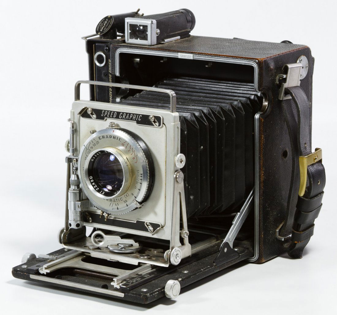 Graflex 'Speed Graphic' Large Format Camera: Graflex 'Speed Graphic' Large Format Camera Serial #848365, having a Kalart Synchronized Range Finder and Kodak Ektar 152mm lens Height: 8.50 inches, Width: 9.00 inches Category: Cameras & Electronics