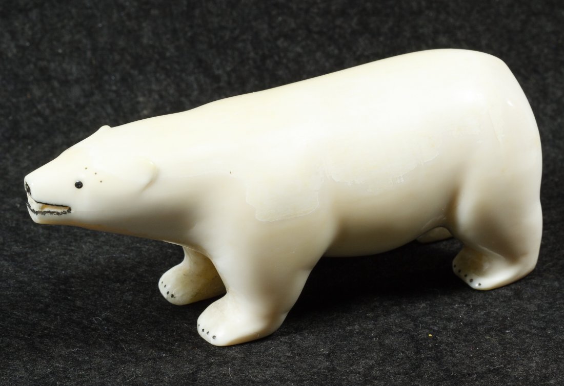 Inuit Walrus Ivory Polar Bear Carving: Inuit Walrus Ivory Polar Bear Carving Early 20th century; having an open-closed mouth with teeth and black painted accents **Please note, this item can only be shipped to a United States address** Hei