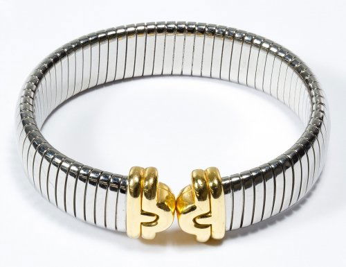 Bulgari (Bvlgari) 18k Gold and Steel Flex Cuff Bracelet: Bulgari (Bvlgari) 18k Gold and Steel Flex Cuff Bracelet Marked near opening Length: 6.25 inches Category: Jewelry & Timepieces > Mixed Gold Shipping Status: Leonard Auction, Inc. will directly ship vi