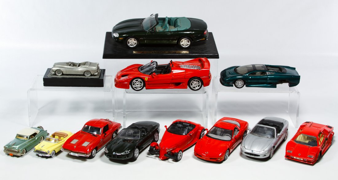Maisto, Burago and Revell Car Model Assortment: Maisto, Burago and Revell Car Model Assortment Including twelve car models with examples such as a 1953 Buick by Revell, Ferrari by Burago and a Jaguar by Maisto Length: 9.75 inches (longest) Category