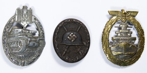 World War II German Metal Badge Assortment: World War II German Metal Badge Assortment Three items including a wound badge, a tank badge and a fleet badge Length: 2.25 inches (largest) Category: Military & Weapons > World War II Shipping Status