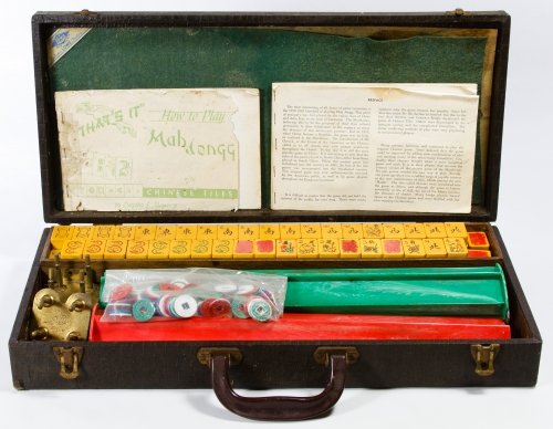 Mah Jongg Set: Mah Jongg Set Having seventy-nine bakelite tiles along with chips, racks and carrying case Width: 19.25 inches Category: Toys and Dolls > Games & Puzzles Shipping Status: Due to size, weight, value or
