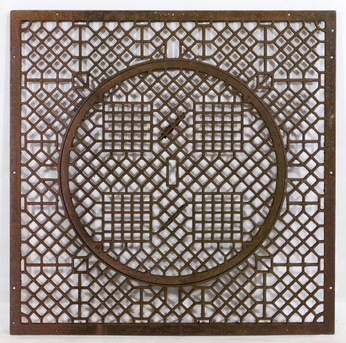 Cast Iron Grate: Cast Iron Grate Having a round center flanked by geometric designs; possibly a cold air return grate Height: 34.00 inches, Width: 34.00 inches Category: Decorative Arts > Lawn & Garden Tax Status: Sub
