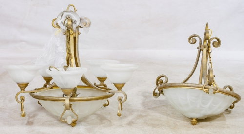 Frosted Glass Chandeliers by Quoizel: Frosted Glass Chandeliers by Quoizel Two metal and frosted glass ceiling lamps; having Made in China decals Height: 29.00 inches, Diameter: 30.50 inches (largest) Category: Decorative Arts > Lamps Shi