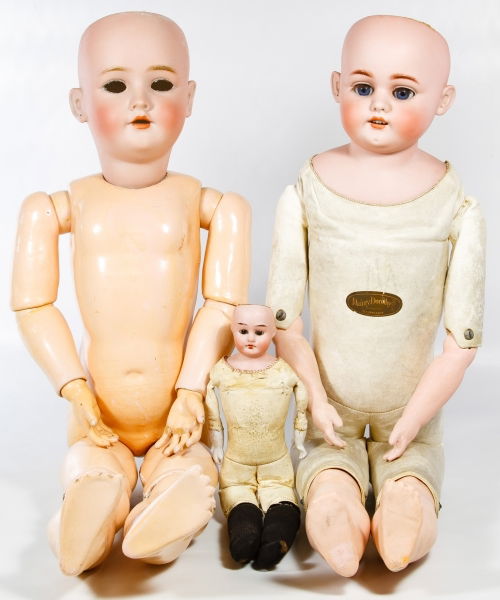 Antique German Bisque Head Doll Assortment: Antique German Bisque Head Doll Assortment Three items including a Simon & Halbig 1080 with a 'Dainty Dorothy' marked kid leather body, a Heinrich Handwerck doll with a red stamped composition body an