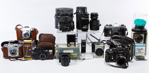 Camera and Lens Assortment: Camera and Lens Assortment Including a Zeiss Contraflex 45mm camera, a Zeiss Contina 45mm camera, a Pentax Sportsmatic, a Minolta XE7 50mm, a Nikon 35mm 'One Touch,' a Minolta 80mm lens and a Tele-Tak
