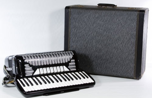 Italian 'Master' Accordion: Italian 'Master' Accordion Numbered 2309 to the underside; together with case and keys Length: 15.00 inches, Width: 20.75 inches (accordion) Category: Musical Instruments > Accordions Shipping Status: