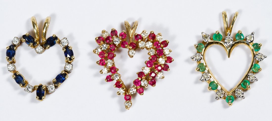14k Gold, Gemstone and Diamond Pendant Assortment: 14k Gold, Gemstone and Diamond Pendant Assortment Three heart-shaped pendants having emerald, spinel and pink topaz, all with diamonds; emerald pendant marked 14k Length: 0.75 inches Weight: 5.27 dwts