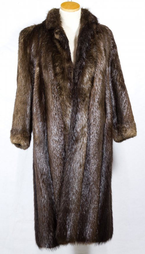 Beaver Fur Coat by Marshall Field: Beaver Fur Coat by Marshall Field Having a brown satin lining and interior belt; from the private collection of Marshall Field department store Length: 44.00 inches, Width: 22.00 inches Category: Clot