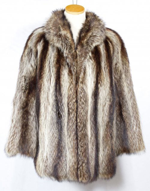 Racoon Fur Coat by Evans: Racoon Fur Coat by Evans Hip length, brown satin lining and label with size 12 Length: 31.00 inches, Width: 22.00 inches Size: 12 Category: Clothing & Accessories > Coats Tax Status: Subject to an 8.2