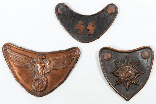 Replica World War II German Gorgets: Replica World War II German Gorgets Three gorgets having German symbols Width: 8.00 inches (widest) Category: Military & Weapons > World War II Shipping Status: Leonard Auction, Inc. will directly shi