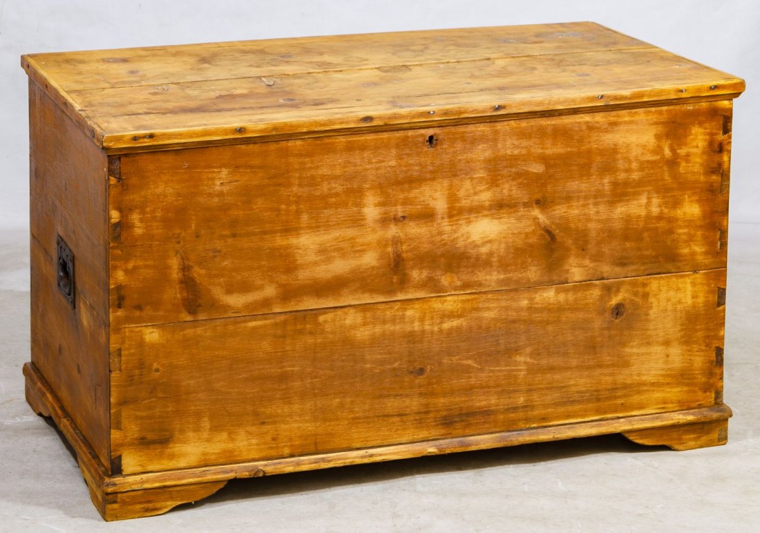 Primitive Pine Blanket Chest: Primitive Pine Blanket Chest Large, flat hinged-top chest with jointed corners and cast iron handles Height: 25.50 inches, Width: 44.00 inches, Depth: 24.00 inches Category: Furniture > American Shipp