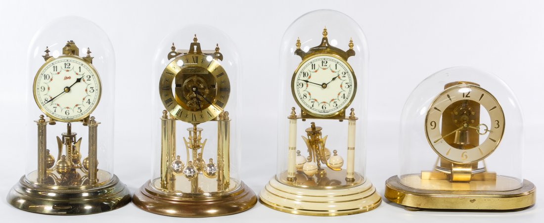 Anniversary Clock Assortment: Anniversary Clock Assortment Four clocks from West Germany Height: 12.00 inches (tallest) Category: Decorative Arts > Clocks Shipping Status: Due to size, weight, value or shipping complexity, this it