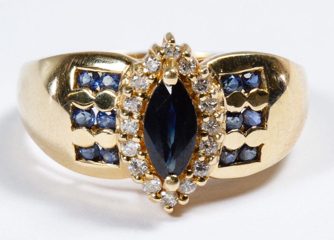 14k Gold, Spinel, Sapphire and Diamond Ring: 14k Gold, Spinel, Sapphire and Diamond Ring Having a marquis cut sapphire surrounded by round cut diamond chips and flanked by round cut spinels; marked 14k inside band Size: 8 Weight: 3.73 dwts. (tot