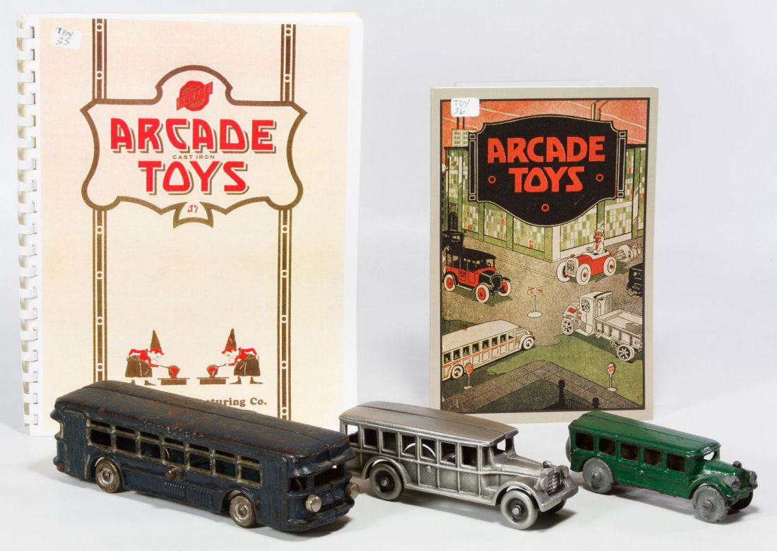 Cast Iron Toy Bus Assortment: Cast Iron Toy Bus Assortment Three buses including one by Arcade and one marked 'Twin-Coach'; together with two booklets on Arcade Toys Length: 8.50 inches (longest) Category: Toys and Dolls > Vintage