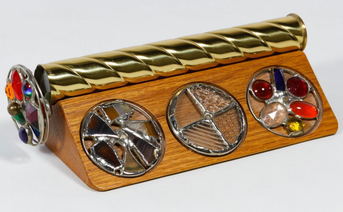 Chesnik-Koch, LTD Brass and Glass Kaleidoscope: Chesnik-Koch, LTD Brass and Glass Kaleidoscope c.1990 signed brass scope with four interchangeable stained glass wheels and a wooden stand Length: 9.00 inches Category: Toys and Dolls > Modern Toys Sh