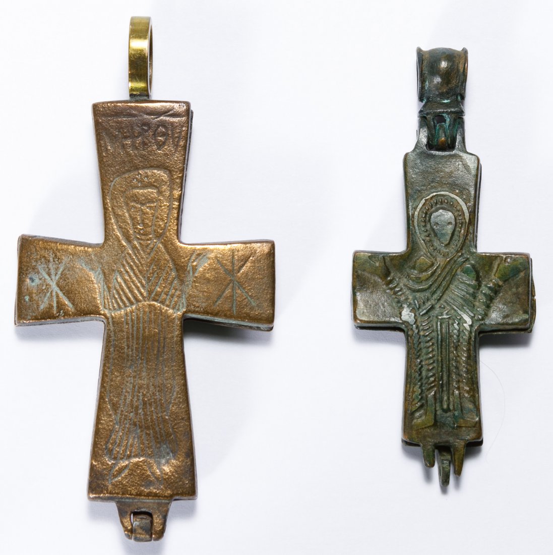Byzantine Reliquary Crosses: Byzantine Reliquary Crosses Two metal hinged pendant crosses bearing the image of Christ Height: 3.50 inches (largest) Category: Collectibles > Religious Shipping Status: Leonard Auction, Inc. will di