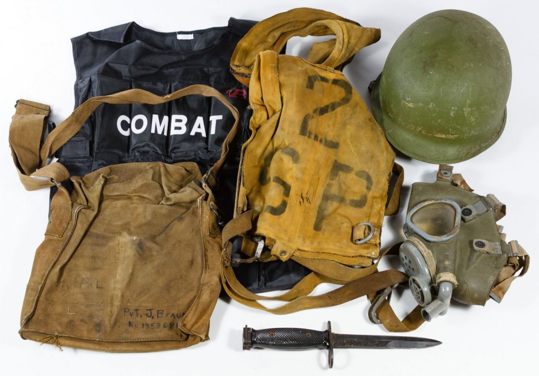 World War II Era Military Items: World War II Era Military Items Five items including a helmet, knife and gas mask; together with a contemporary combat vest Length: 11.00 inches (helmet) Category: Military & Weapons > World War II Sh