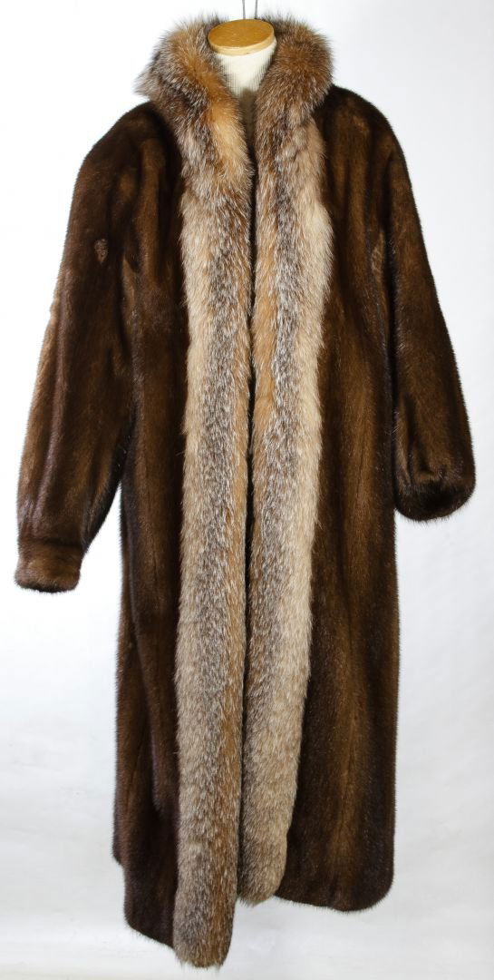 Mink Fur Coat by Christian Dior: Mink Fur Coat by Christian Dior Having an Evans Collection label, a fox fur collar and brown satin lining Length: 45.00 inches, Width: 25.00 inches Category: Clothing & Accessories > Coats Shipping St